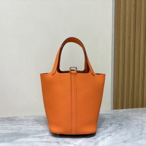 Orange Picotin Lock with central leather strap and padlock, front view