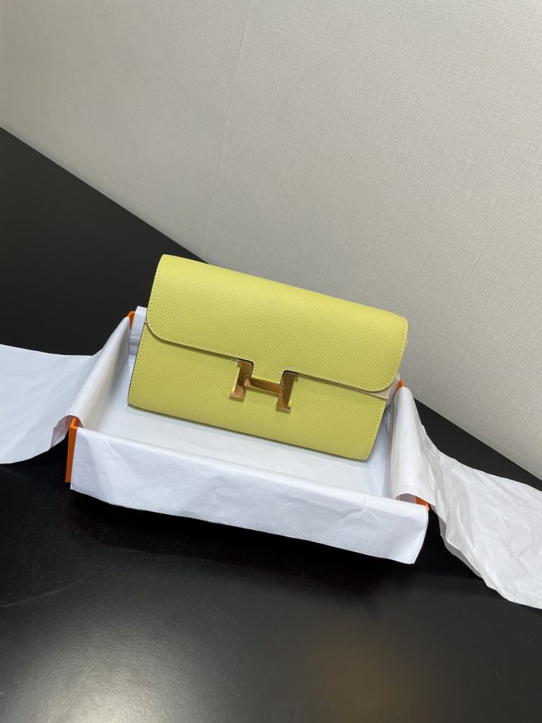 Constance To Go — 20.5 × 13 × 2 cm — Lemon Yellow — Epsom leather — Gold-tone hardware