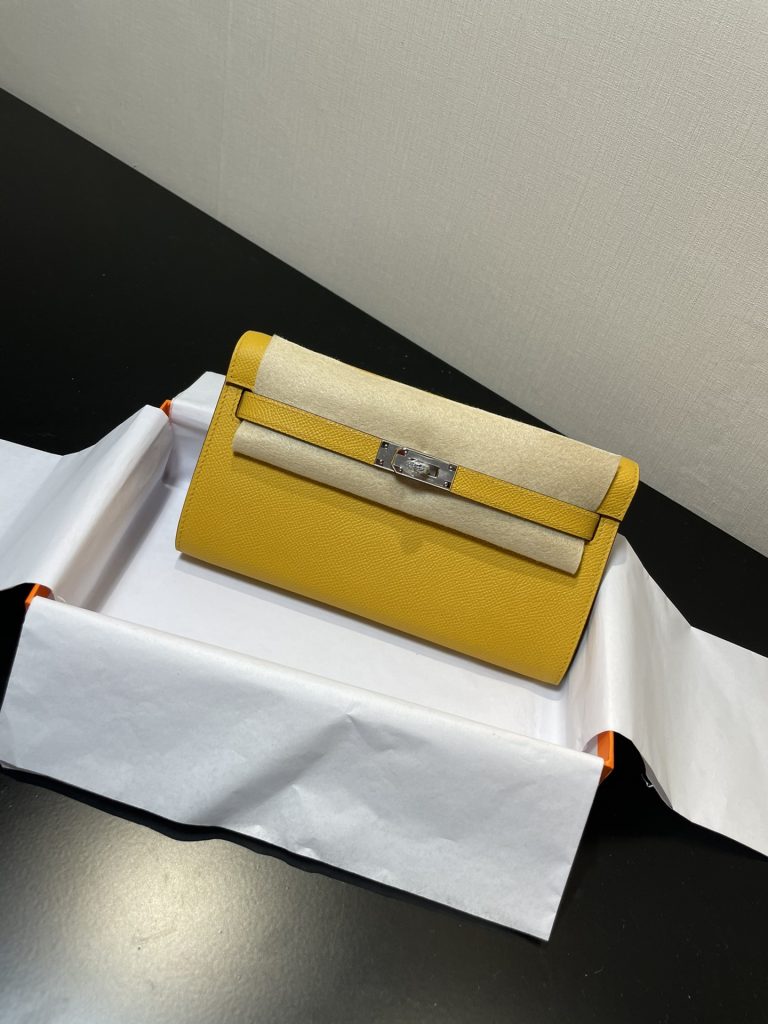 Kelly WOC — 20.5 × 11 × 2 cm — Naples Yellow — Epsom leather