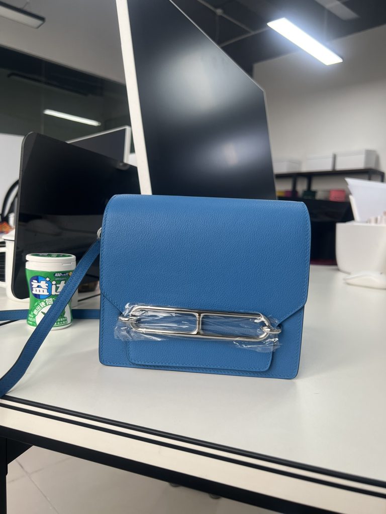 Roulis — 19 cm — Water Spirit Blue — Evercolor leather — Gold-tone or silver-tone hardware