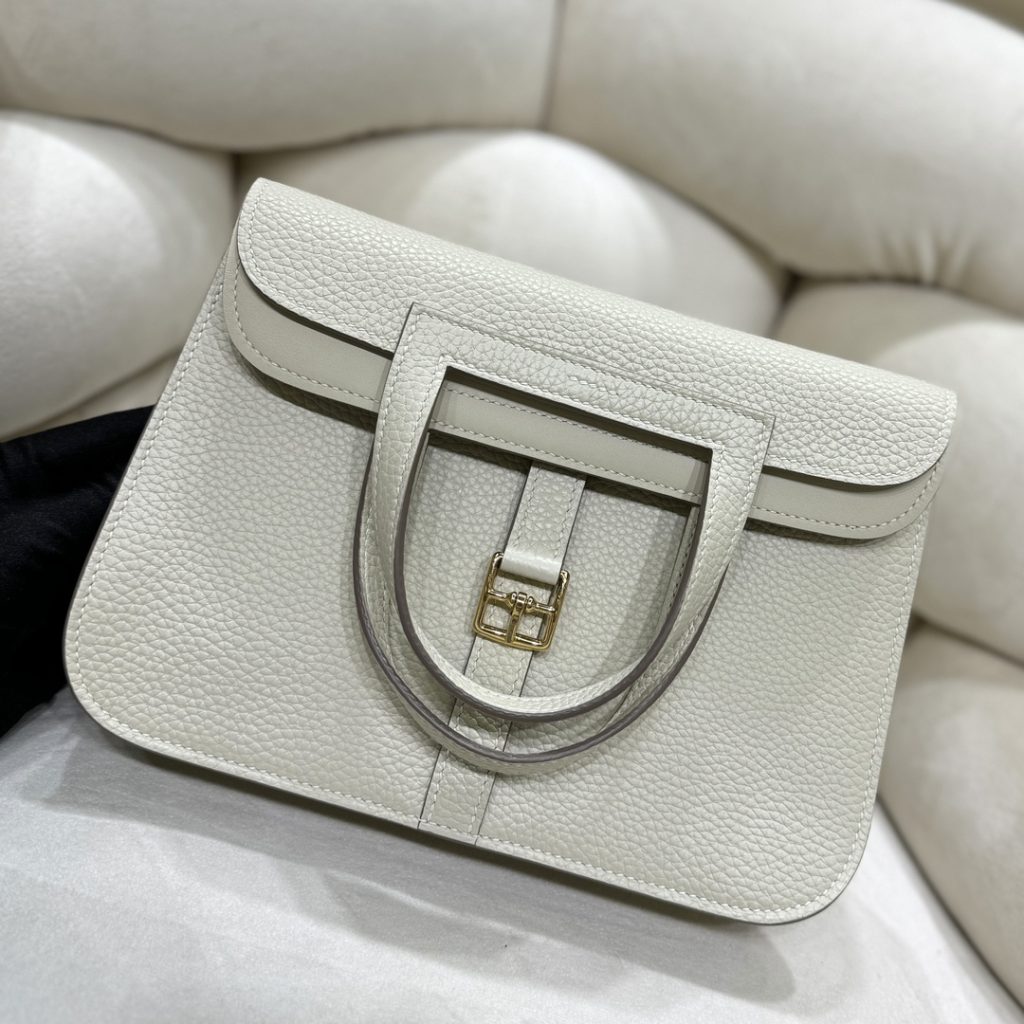 Halzan — TC leather exterior — Swift leather lining — Stainless-steel hardware