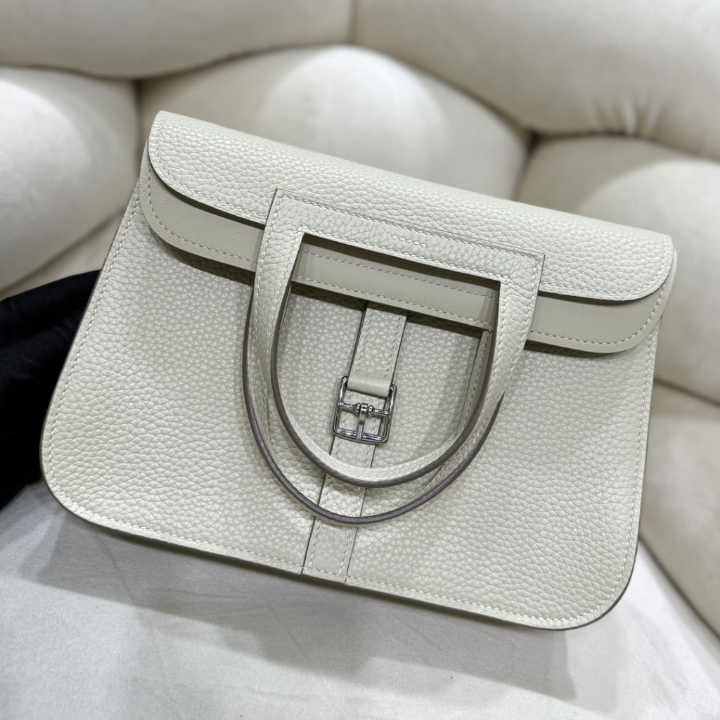 Halzan — TC leather exterior — Swift leather lining — Stainless-steel hardware