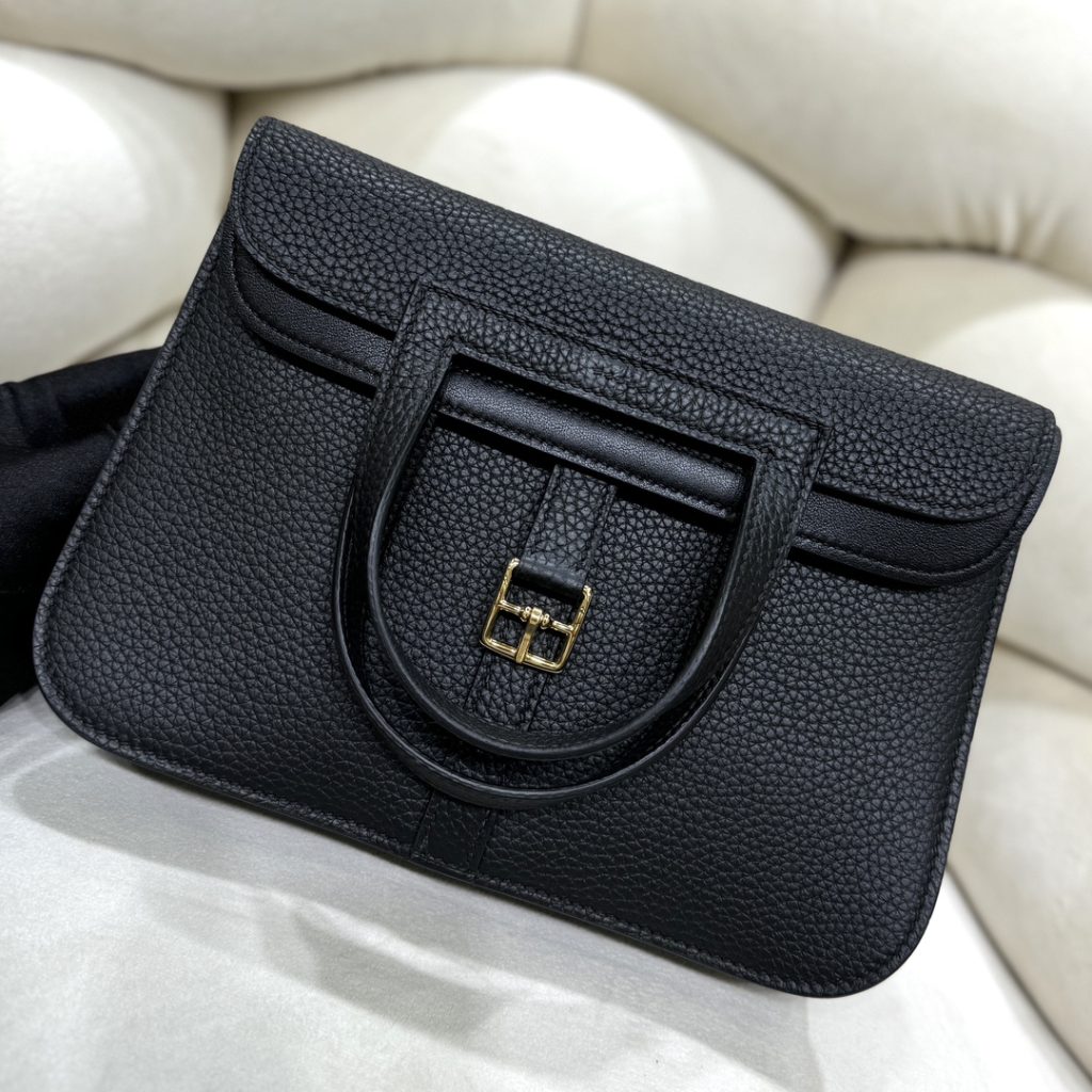 Halzan — TC leather exterior — Swift leather lining — Stainless-steel hardware