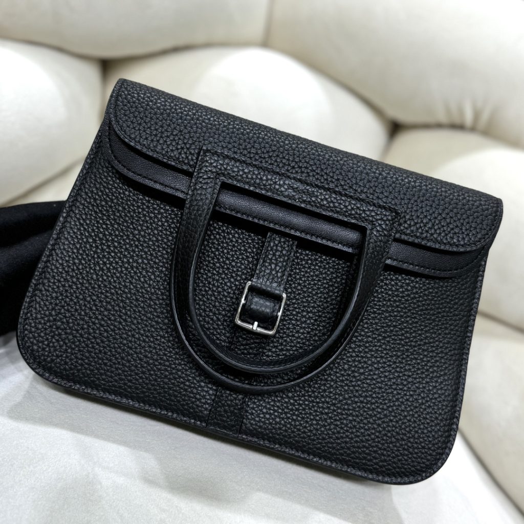Halzan — TC leather exterior — Swift leather lining — Stainless-steel hardware