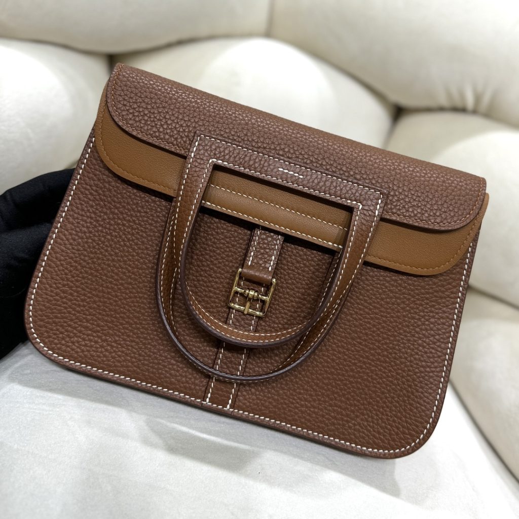 Halzan — TC leather exterior — Swift leather lining — Stainless-steel hardware