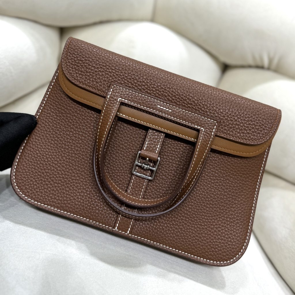 Halzan — TC leather exterior — Swift leather lining — Stainless-steel hardware
