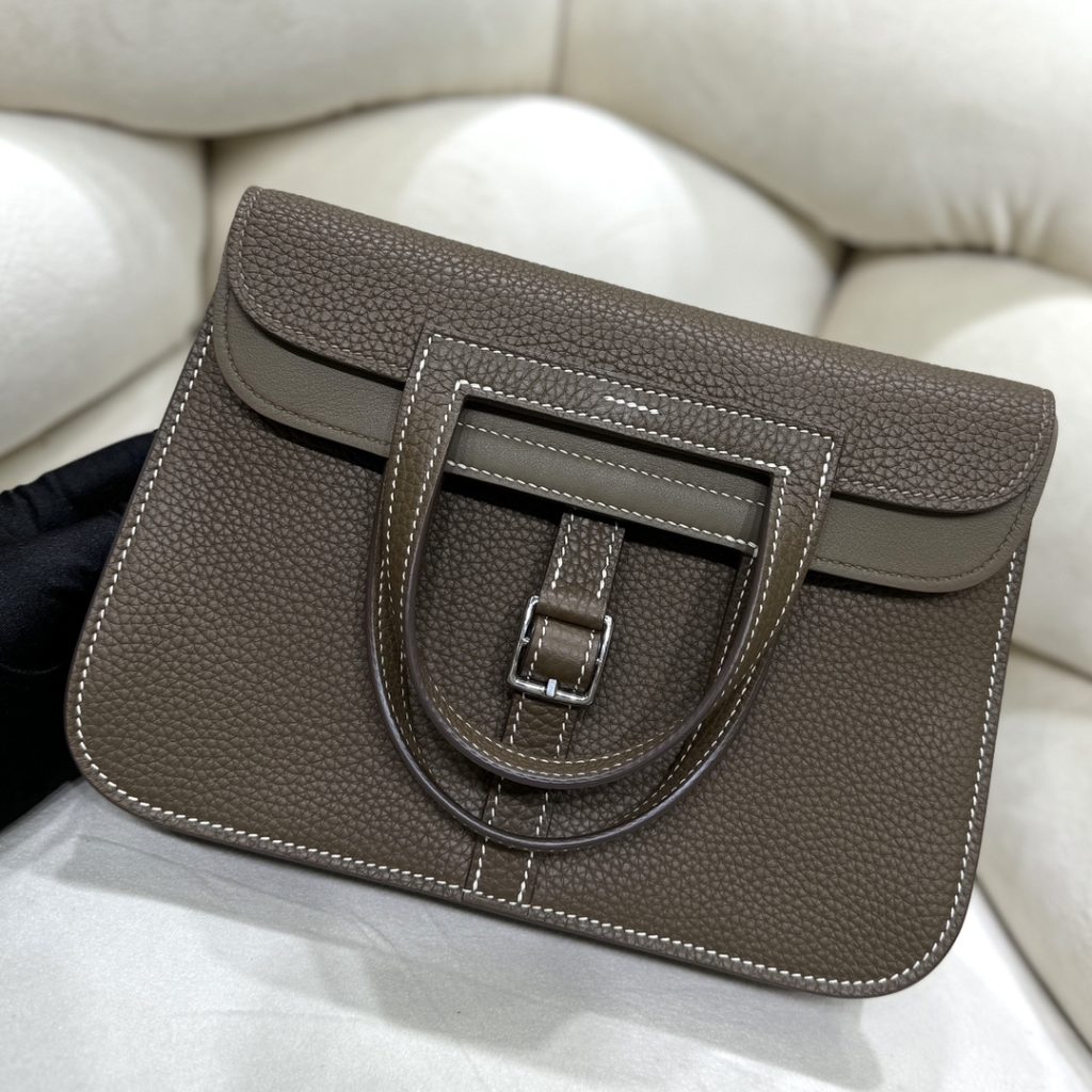 Halzan — TC leather exterior — Swift leather lining — Stainless-steel hardware