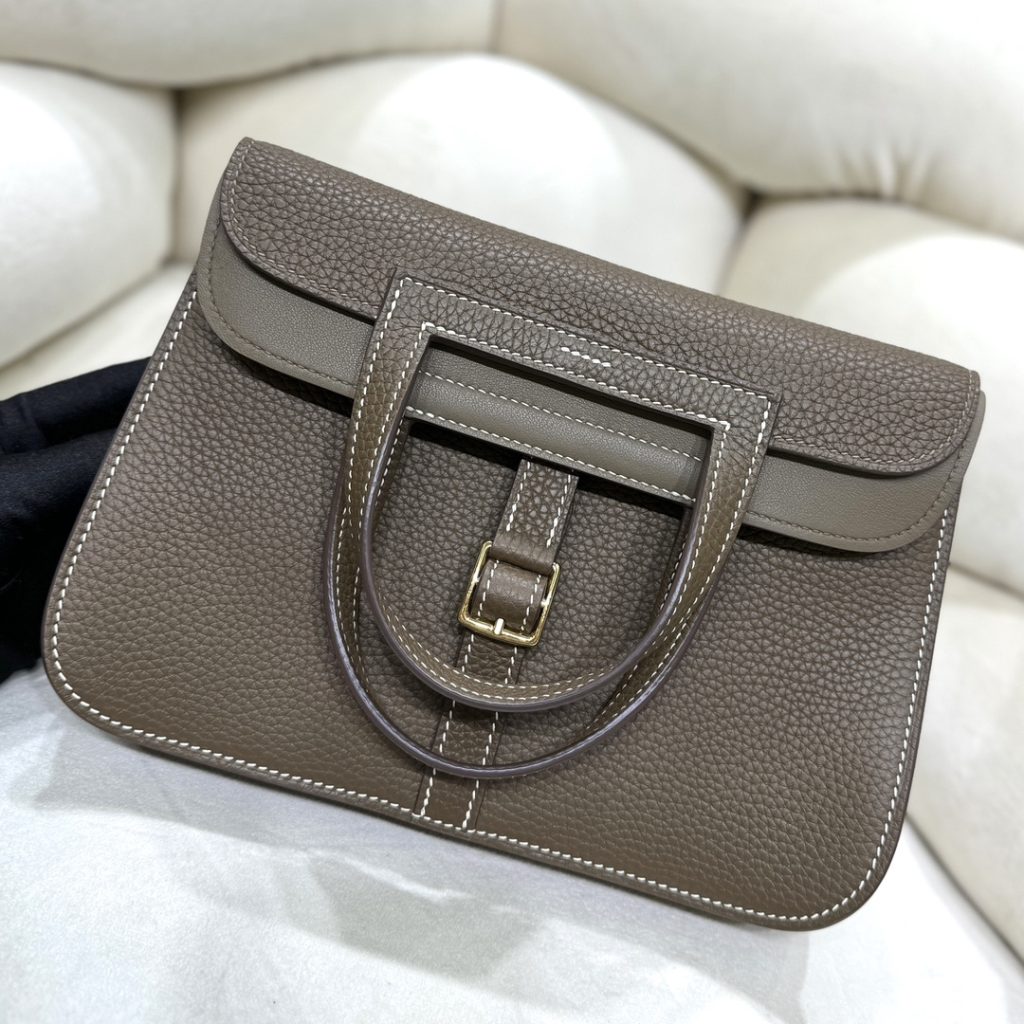 Halzan — TC leather exterior — Swift leather lining — Stainless-steel hardware