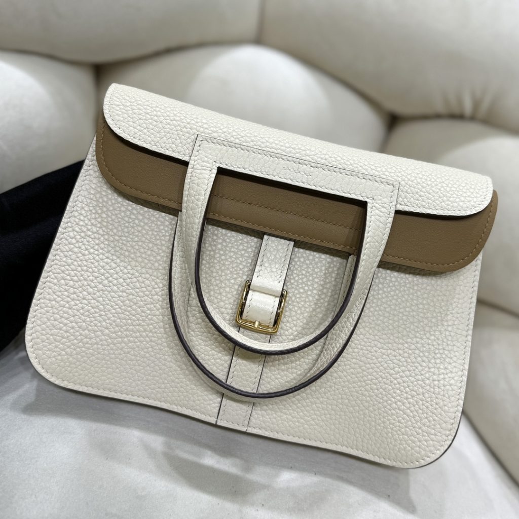 Halzan — TC leather exterior — Swift leather lining — Stainless-steel hardware