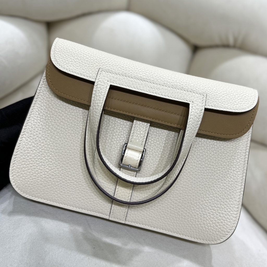 Halzan — TC leather exterior — Swift leather lining — Stainless-steel hardware