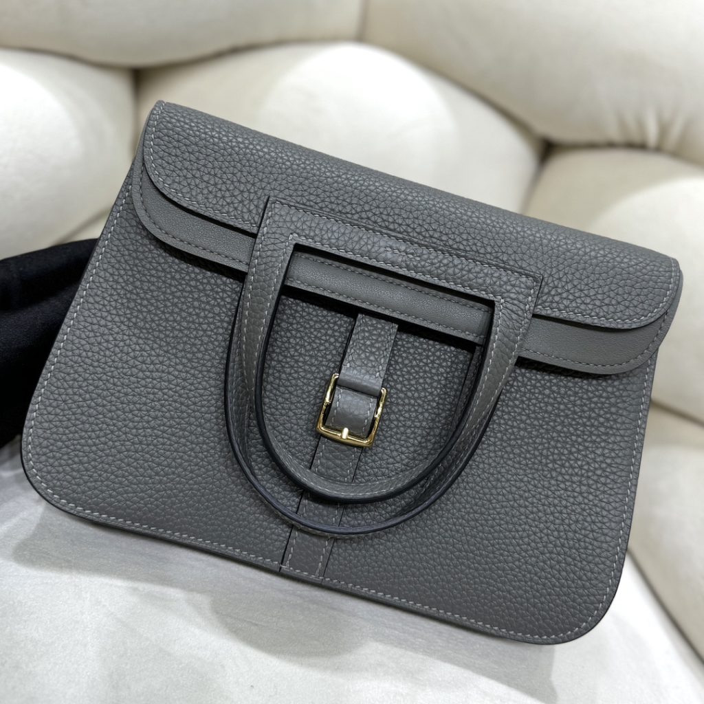 Halzan — TC leather exterior — Swift leather lining — Stainless-steel hardware