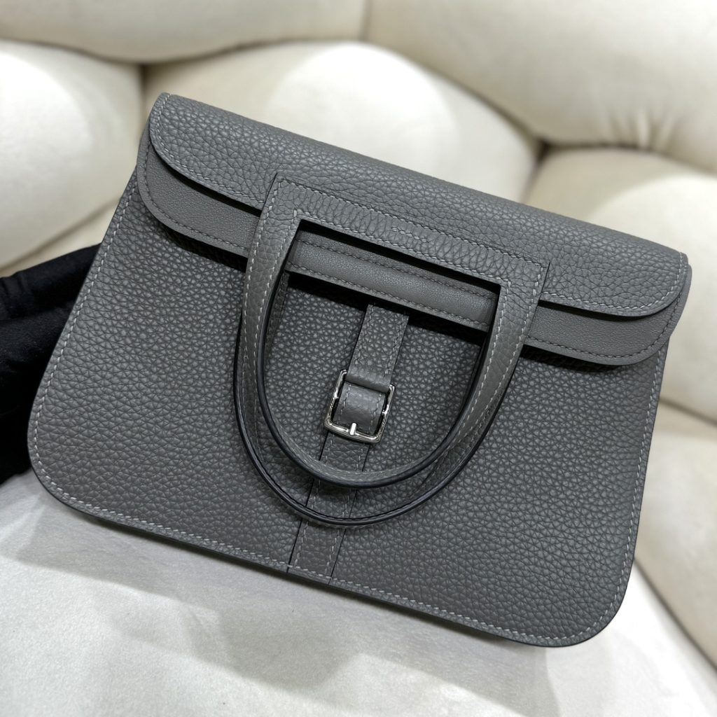 Halzan — TC leather exterior — Swift leather lining — Stainless-steel hardware