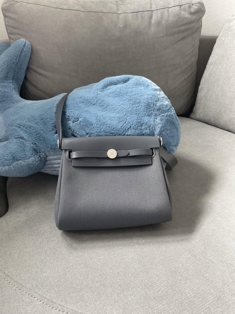 Mini Herbag — a canvas body with leather trim — Gold-tone or silver-tone hardware