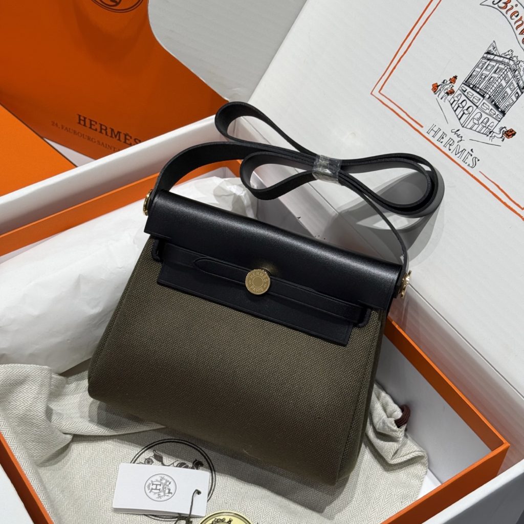 Mini Herbag — Army Green — a canvas body with leather trim — Gold-tone or silver-tone hardware