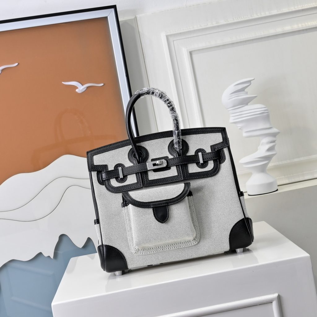 New 25 cm Birkin Cargo in Swift leather and canvas with silver-tone…
